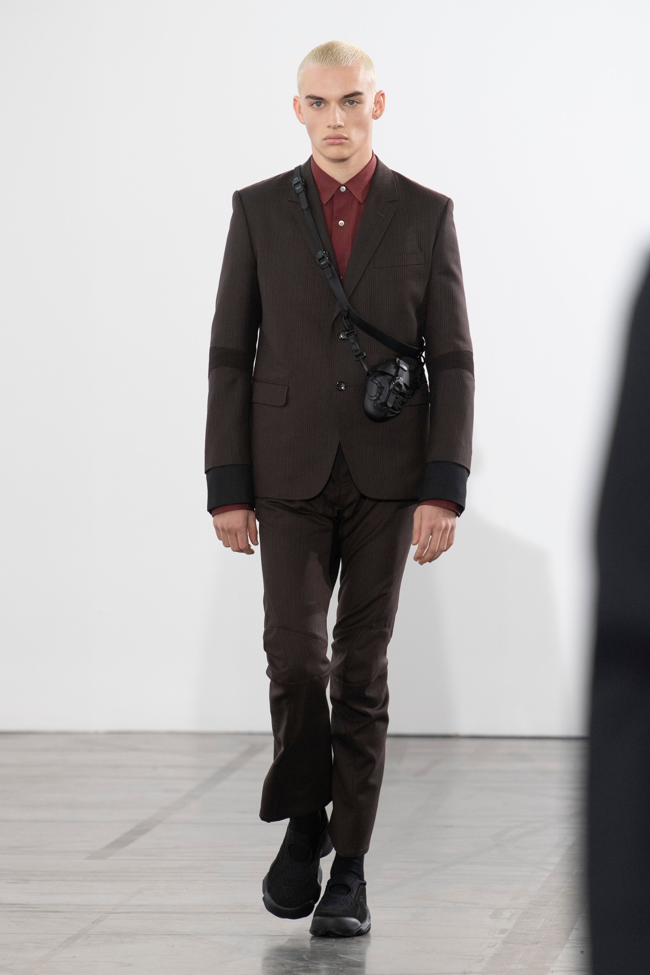 Fashion model wearing a Junya Watanabe Man outfit