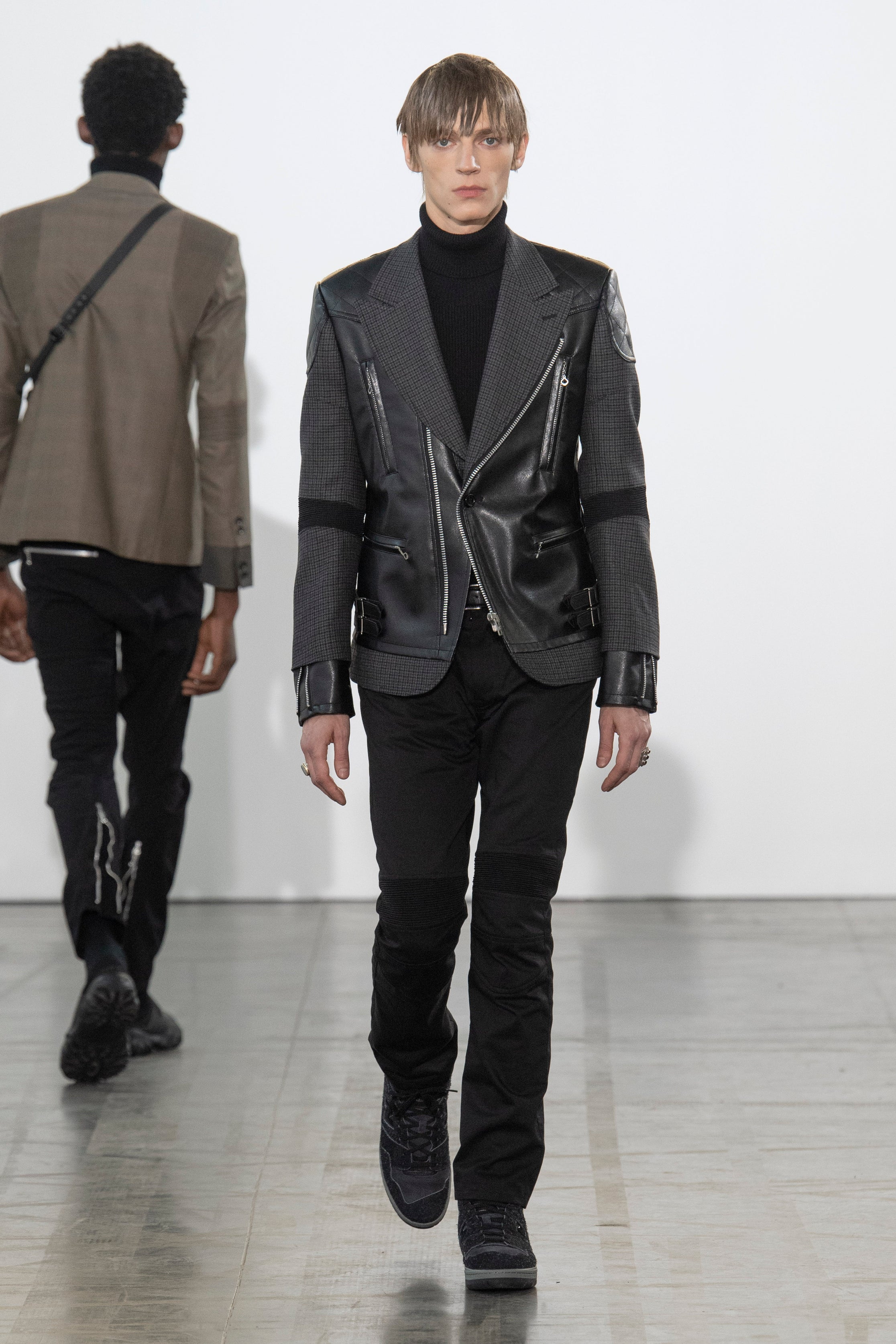 Fashion model wearing a Junya Watanabe Man outfit