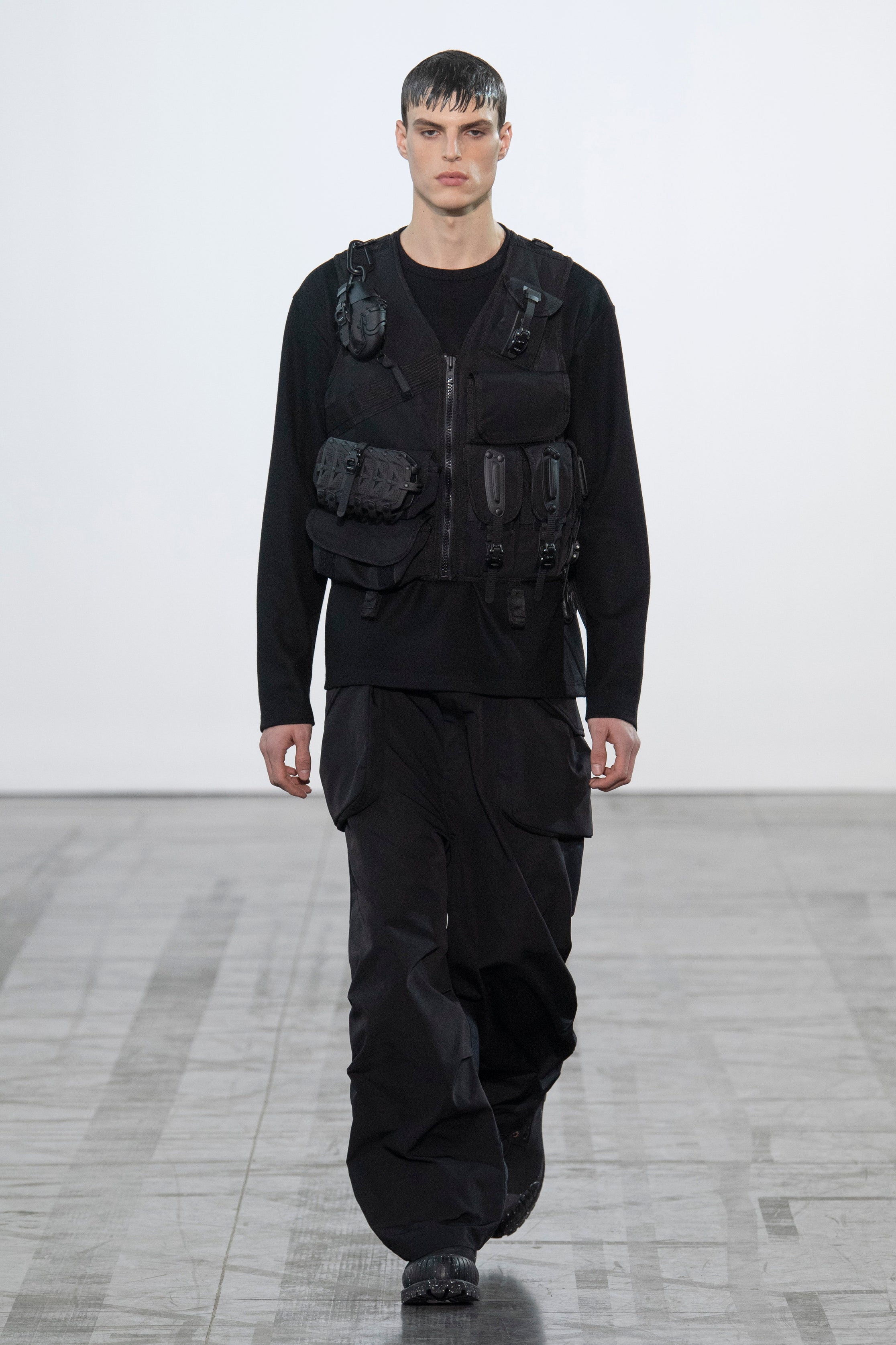 Fashion model wearing a Junya Watanabe Man outfit
