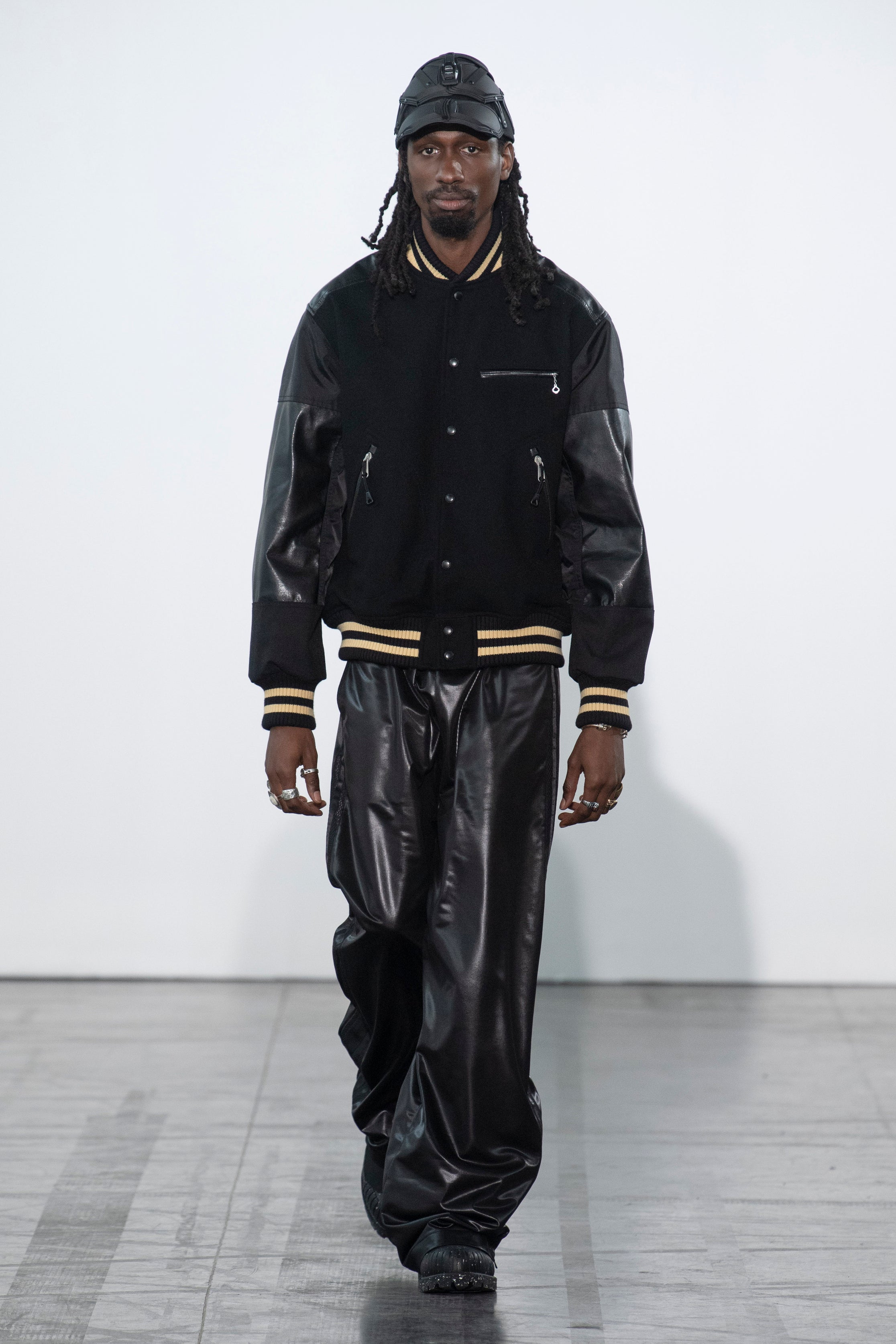 Fashion model wearing a Junya Watanabe Man outfit