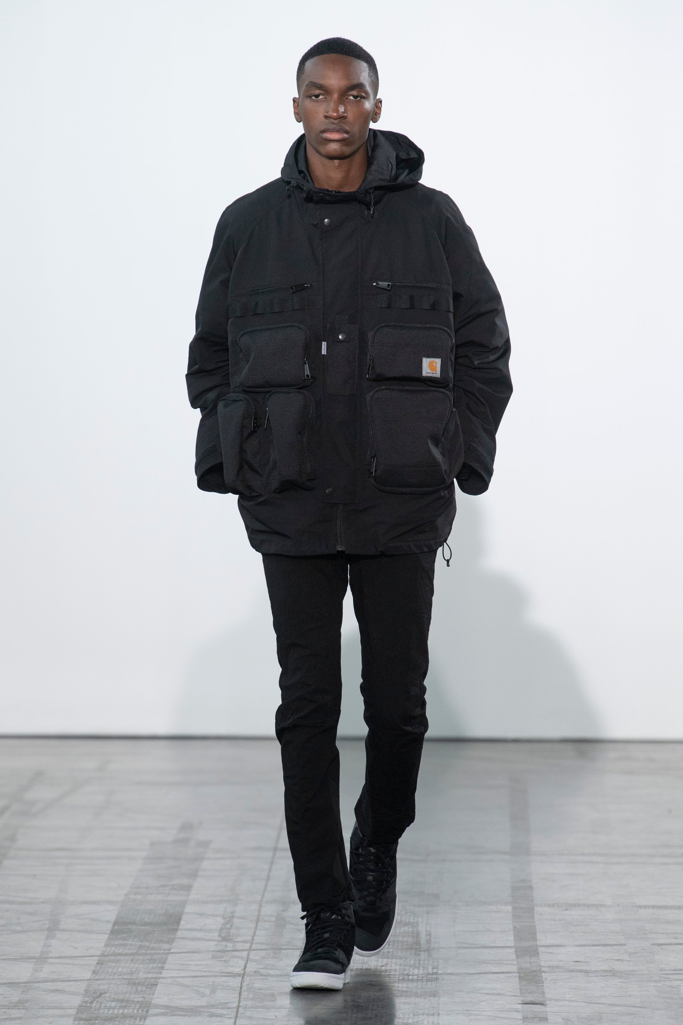 Fashion model wearing a Junya Watanabe Man outfit