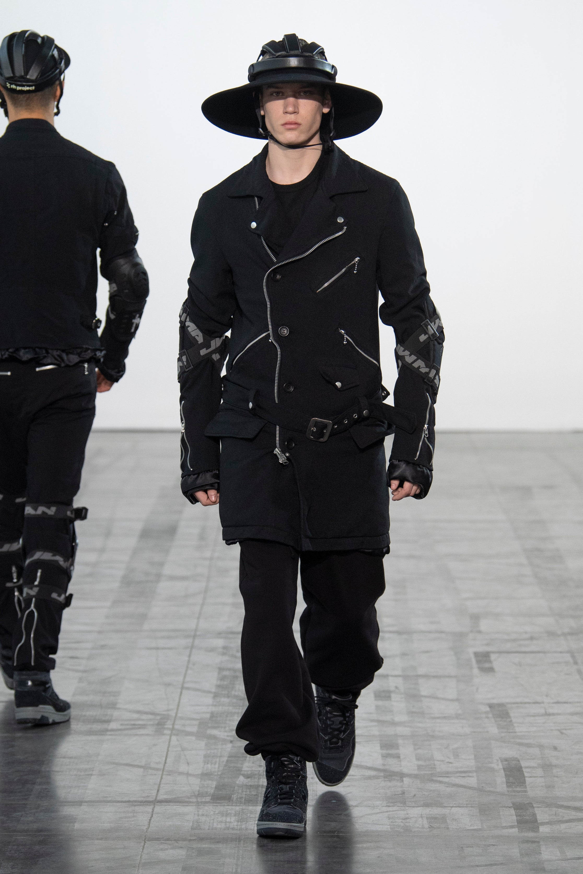 Fashion model wearing a Junya Watanabe Man outfit