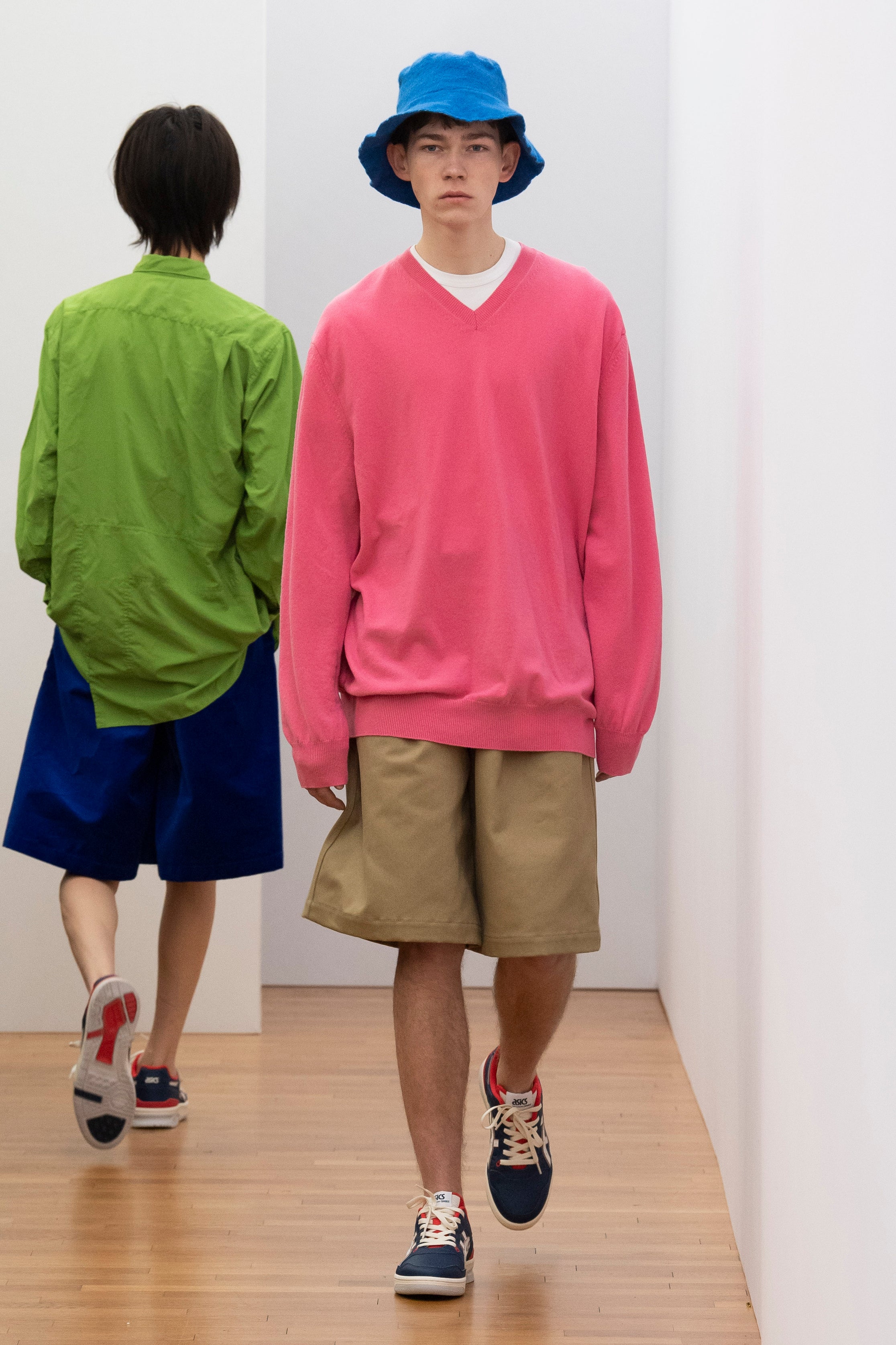 Fashion model wearing a Comme des Garçons Shirt outfit