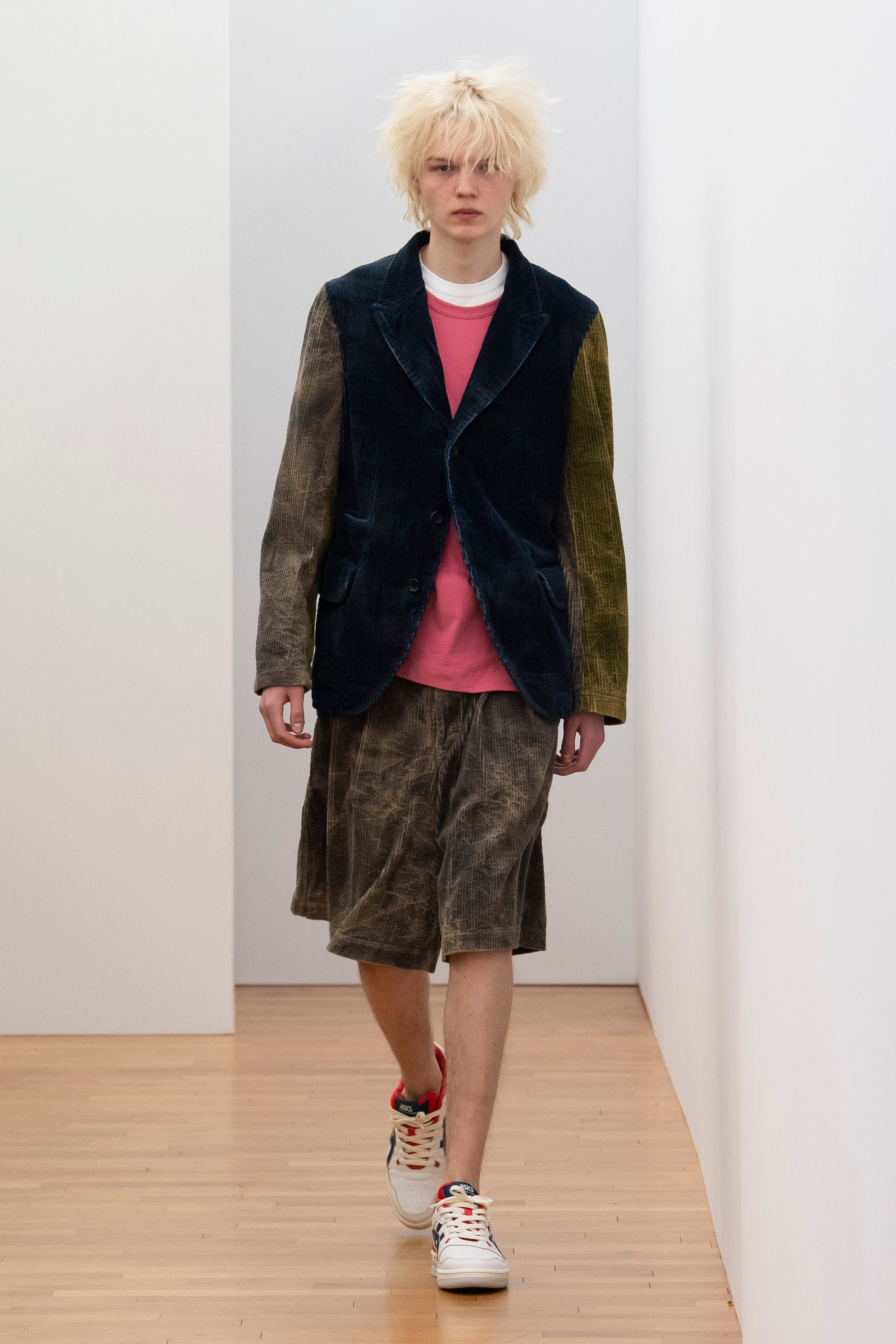 Fashion model wearing a Comme des Garçons Shirt outfit