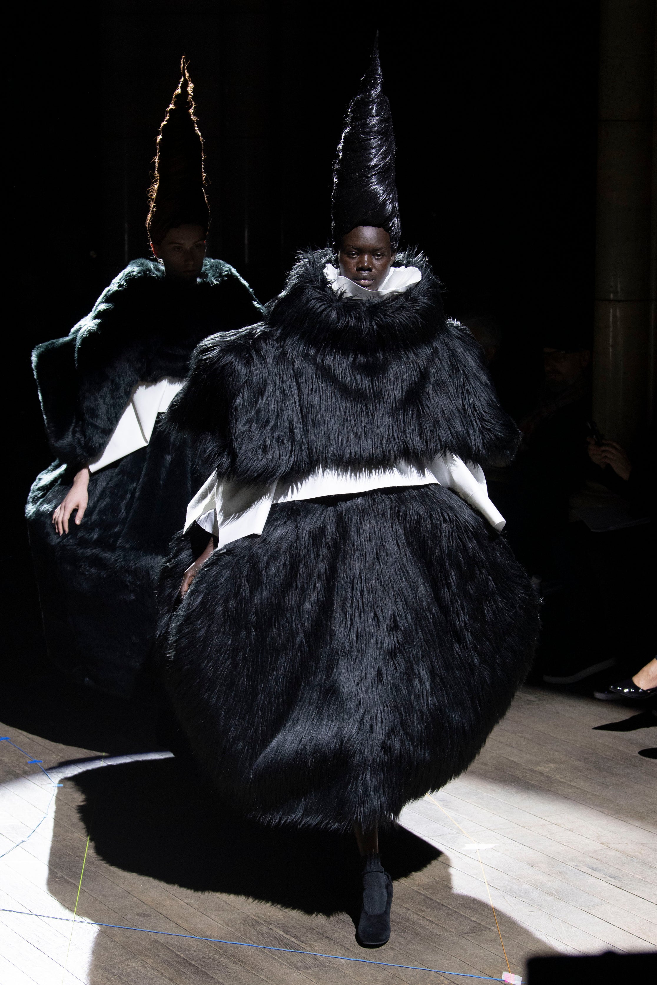 Fashion model wearing a Comme des Garçons outfit