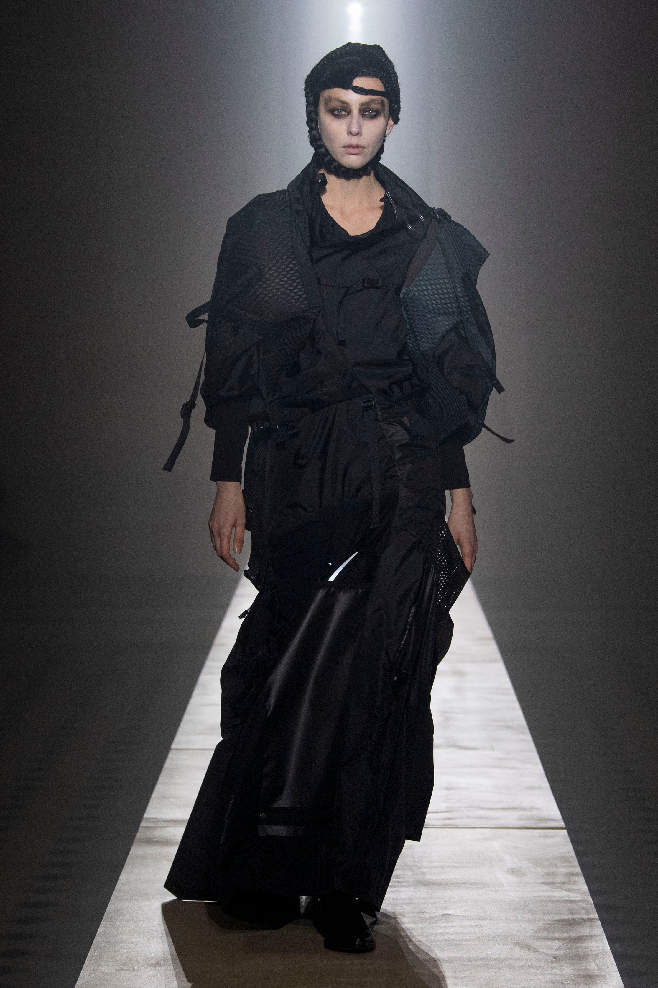 Fashion model wearing a Junya Watanabe outfit