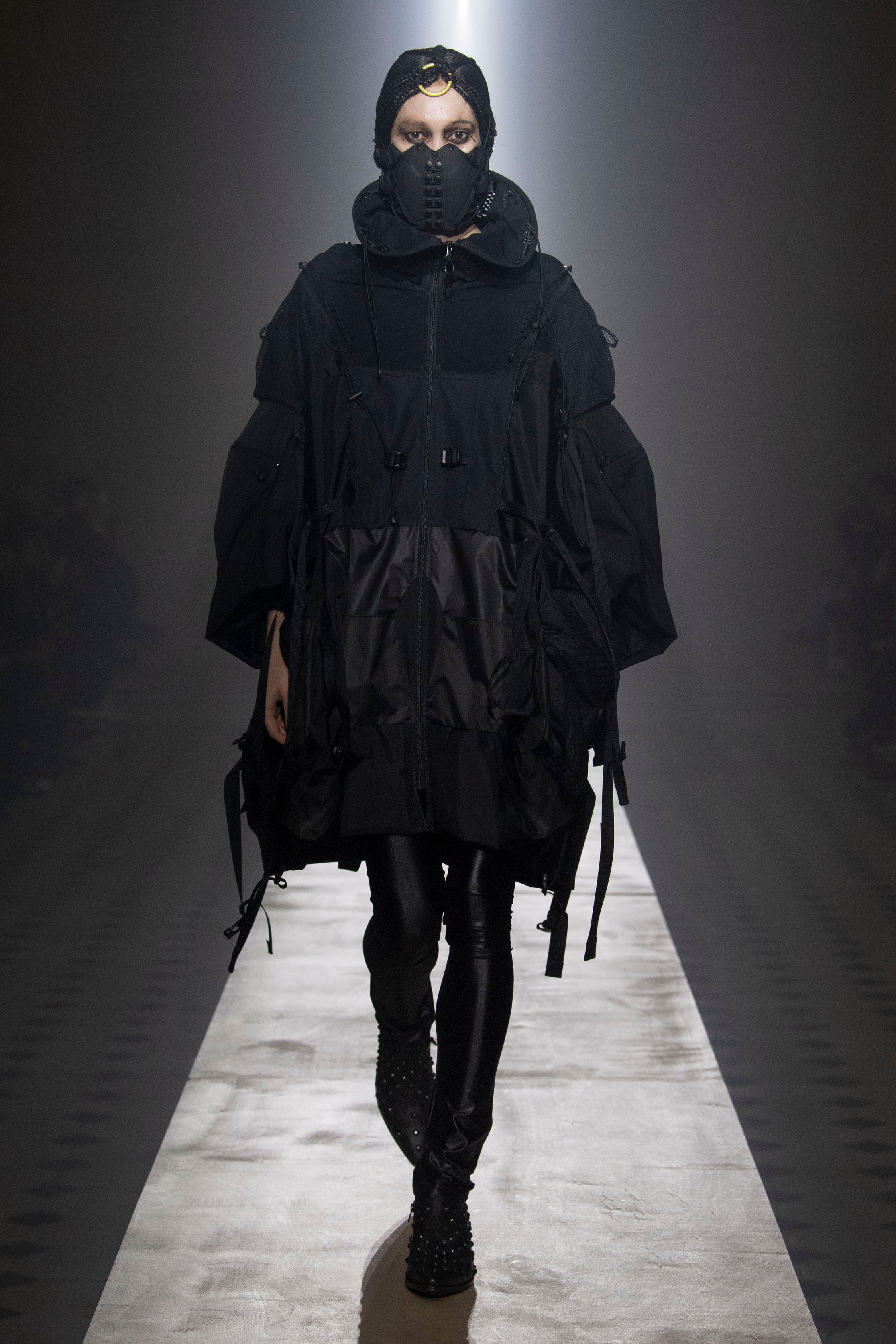 Fashion model wearing a Junya Watanabe outfit