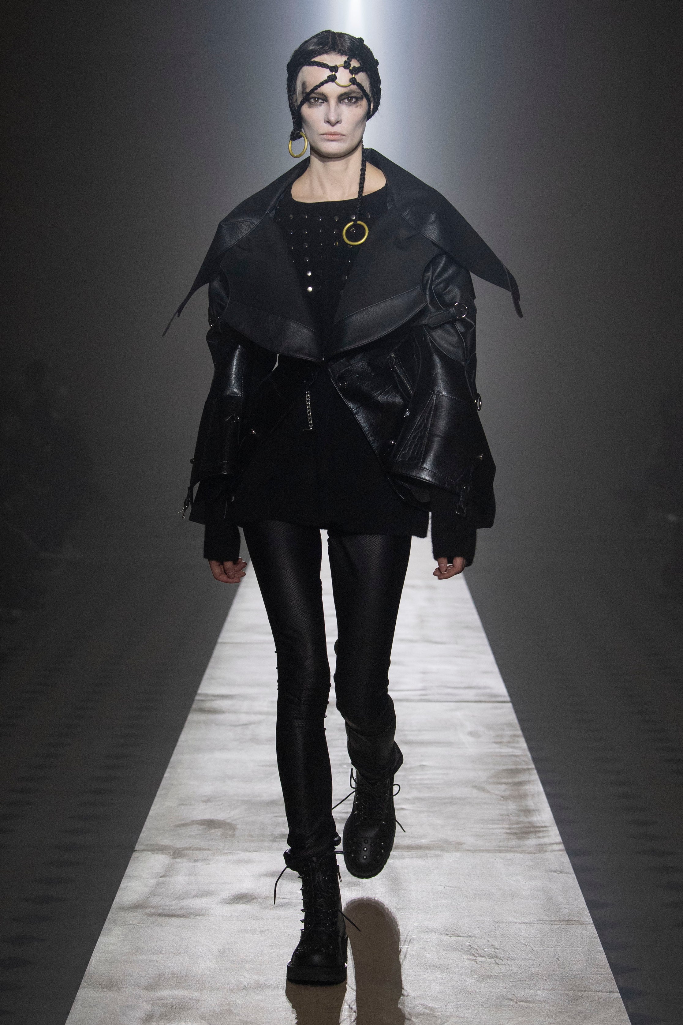 Fashion model wearing a Junya Watanabe outfit