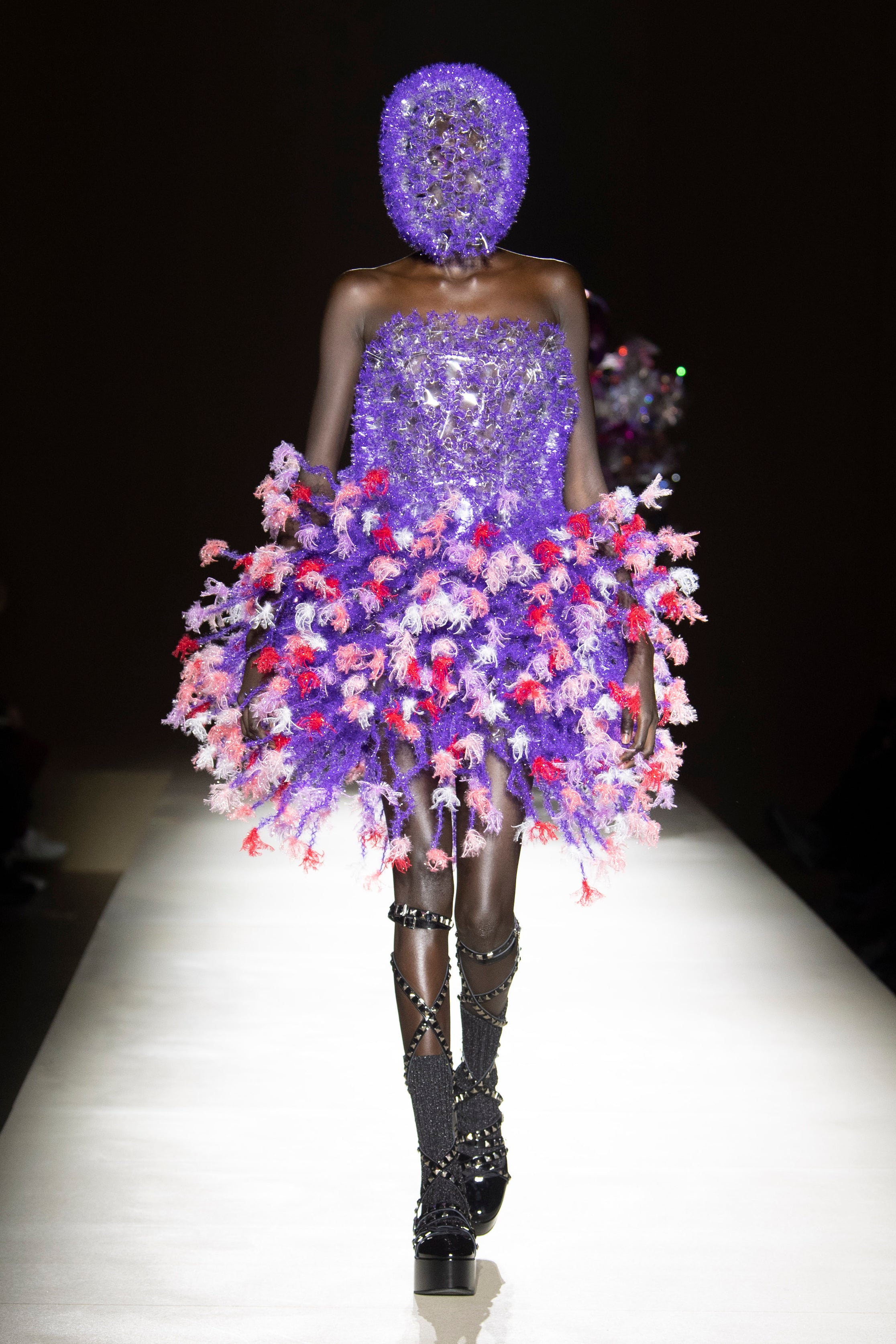 Fashion model wearing a noir kei ninomiya outfit