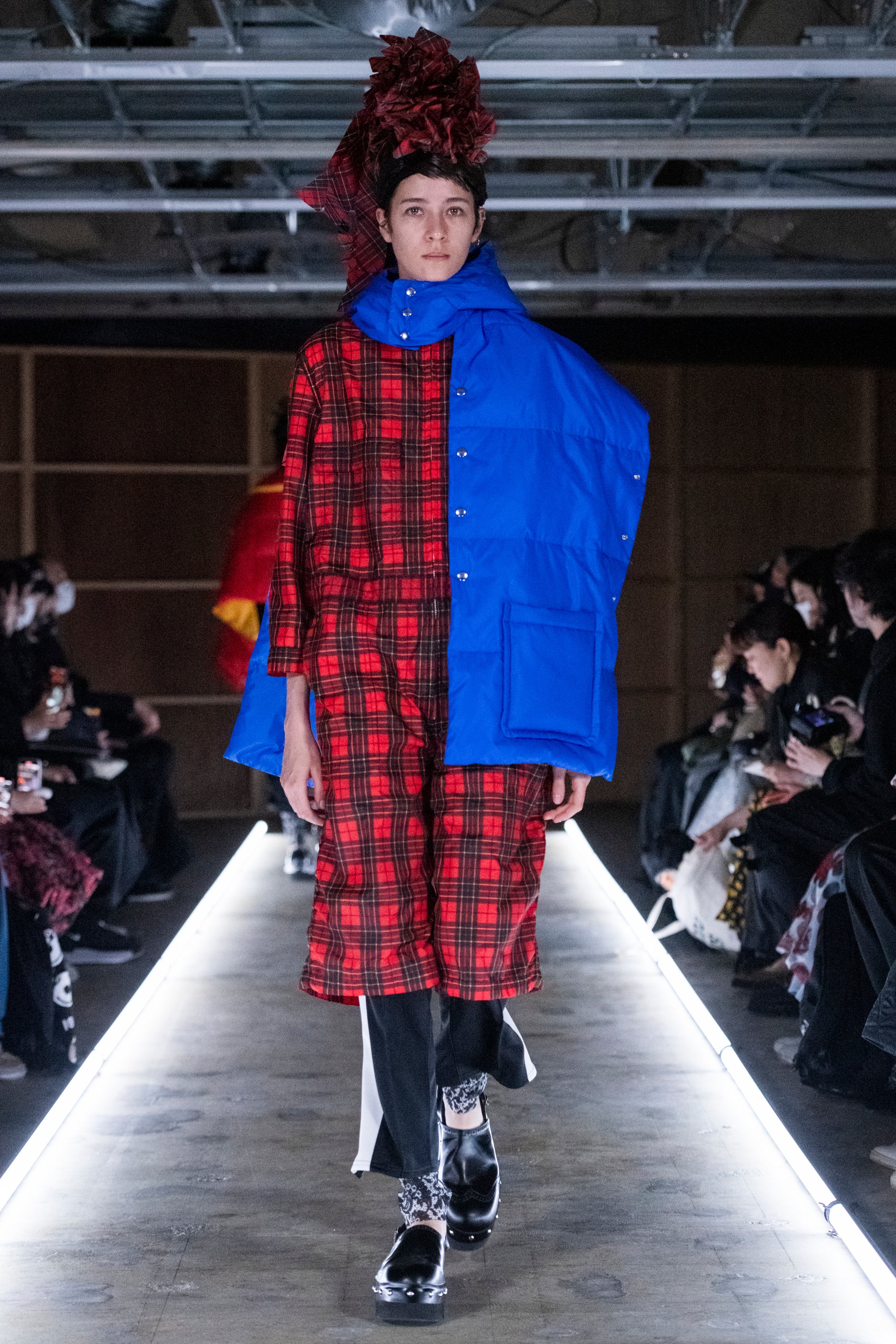 Fashion model wearing a tao outfit