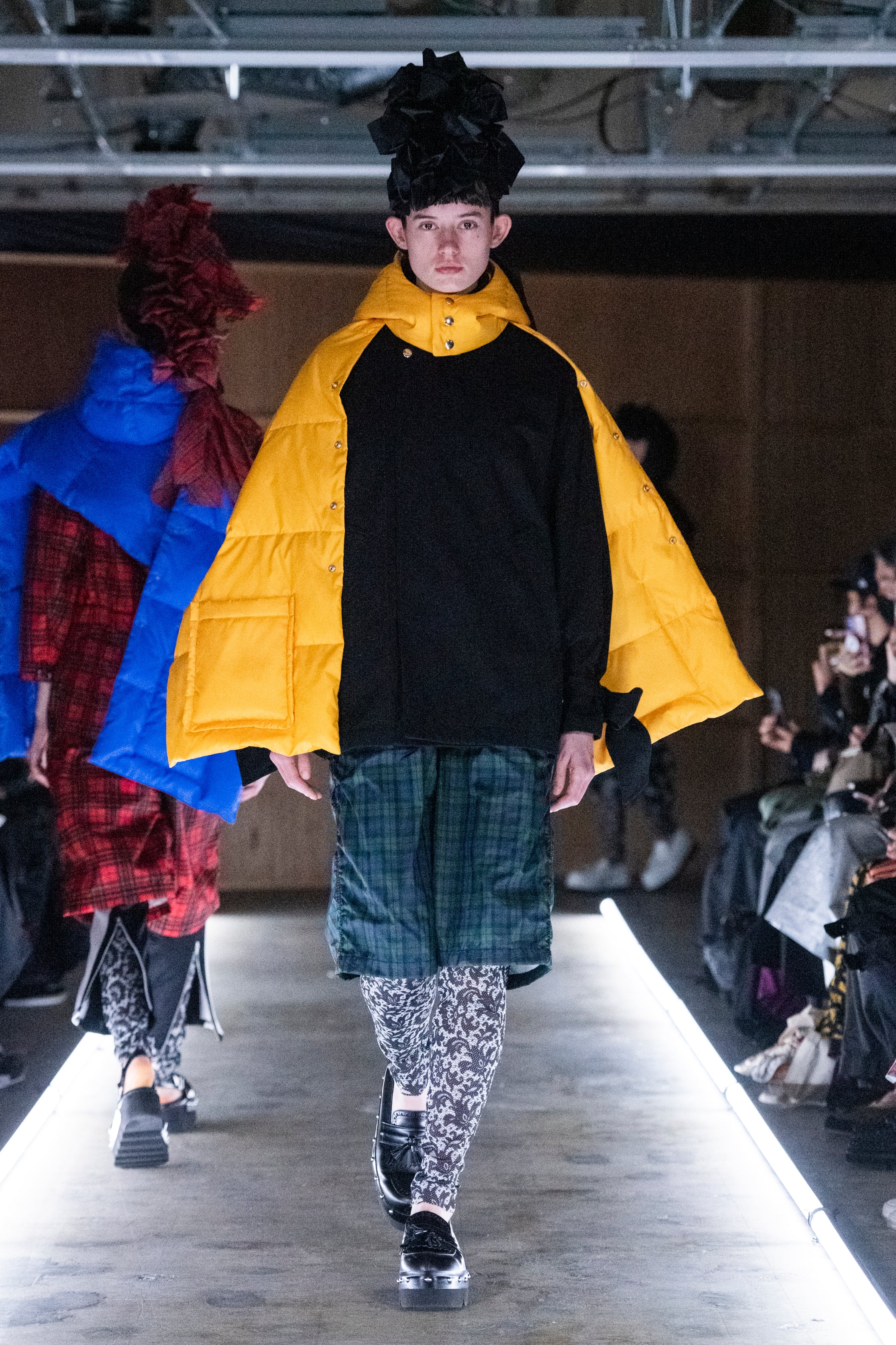 Fashion model wearing a tao outfit