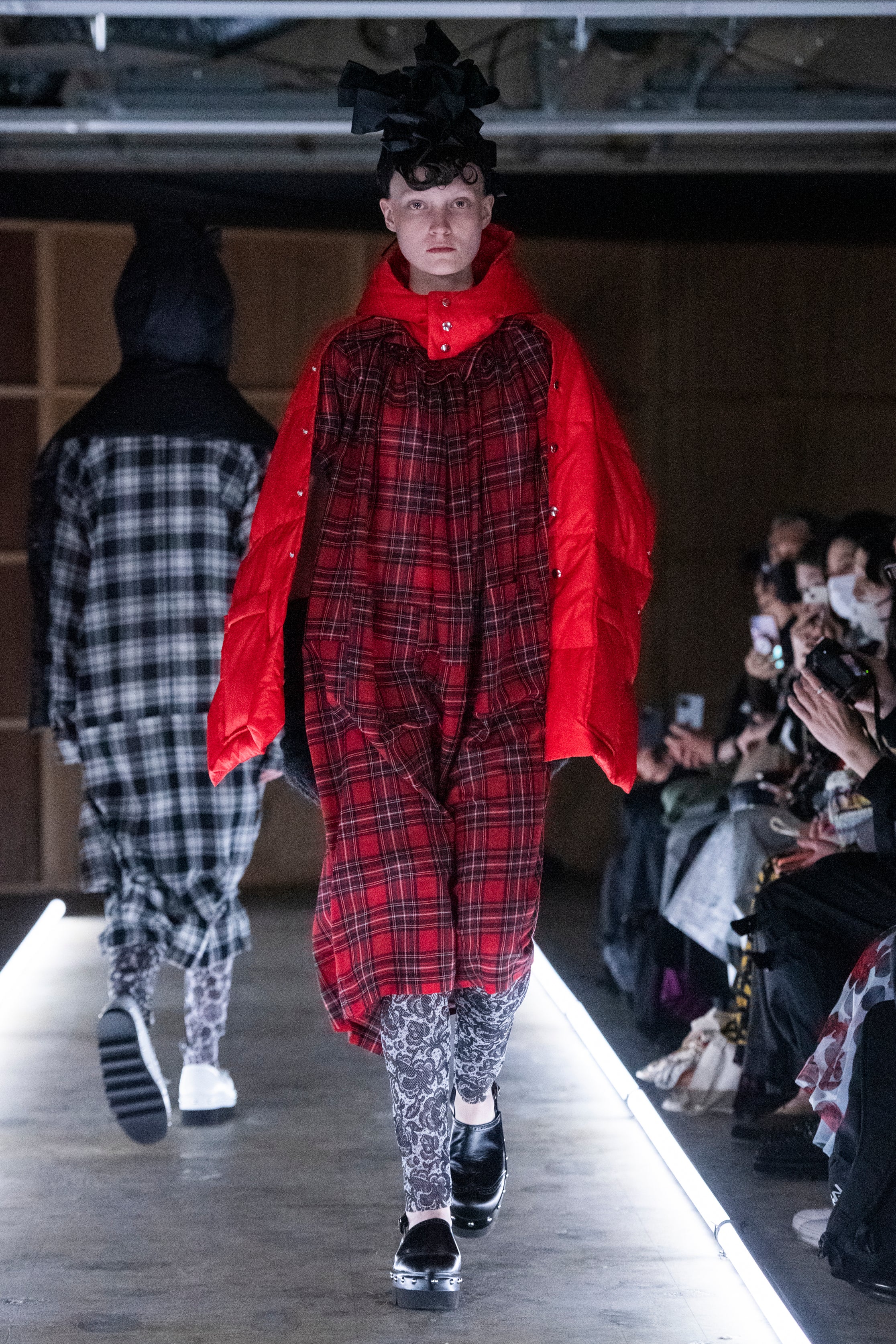 Fashion model wearing a tao outfit