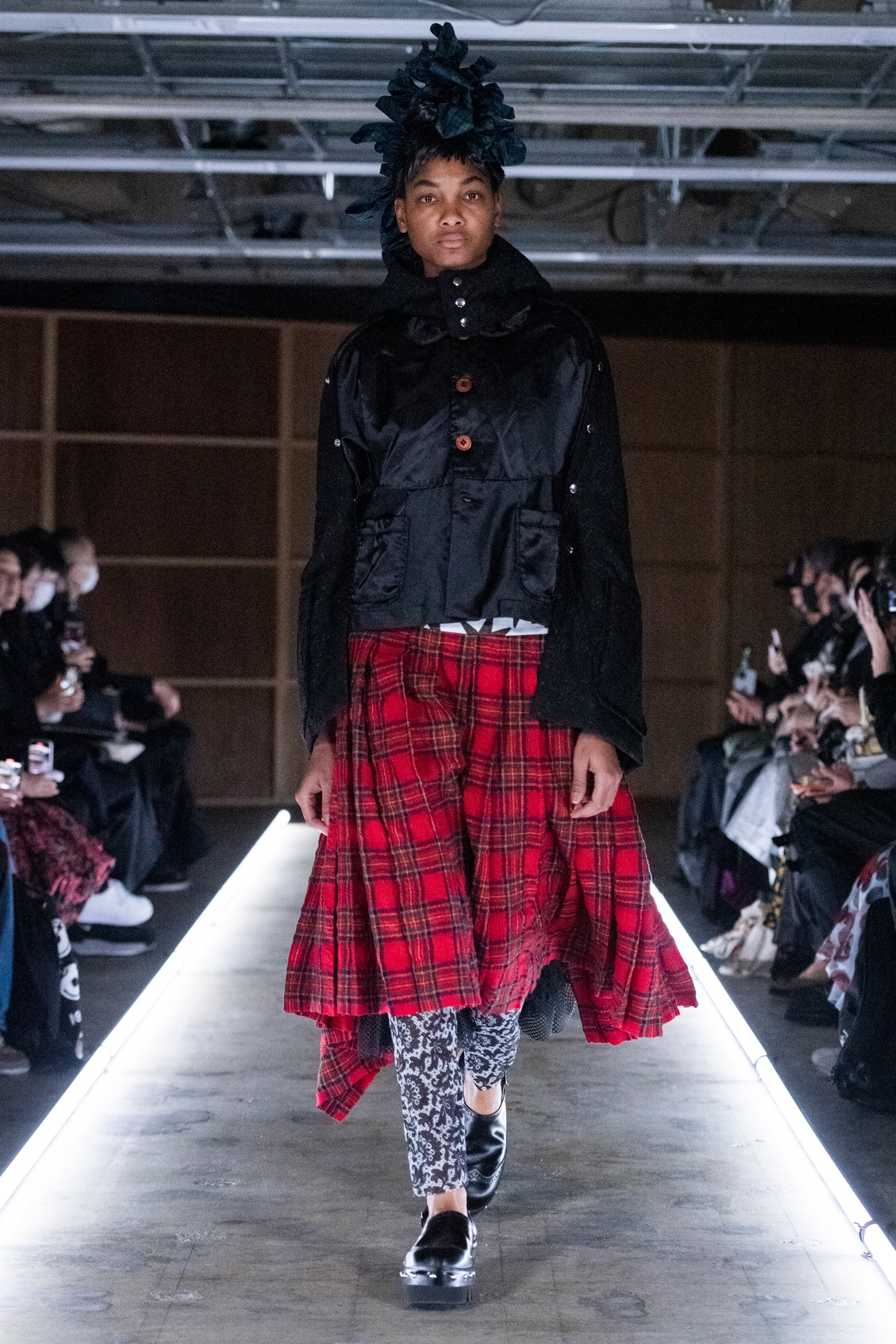 Fashion model wearing a tao outfit