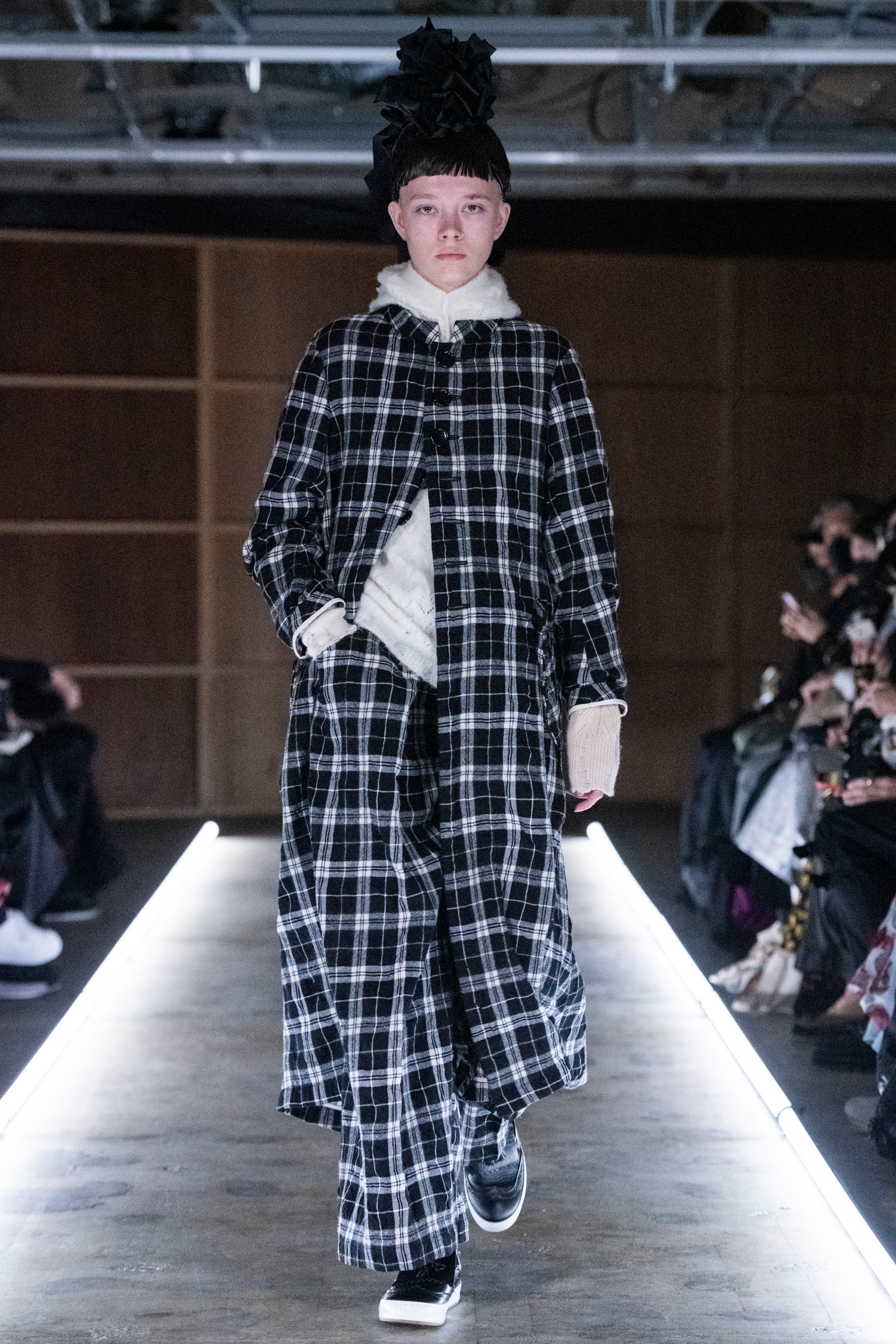 Fashion model wearing a tao outfit