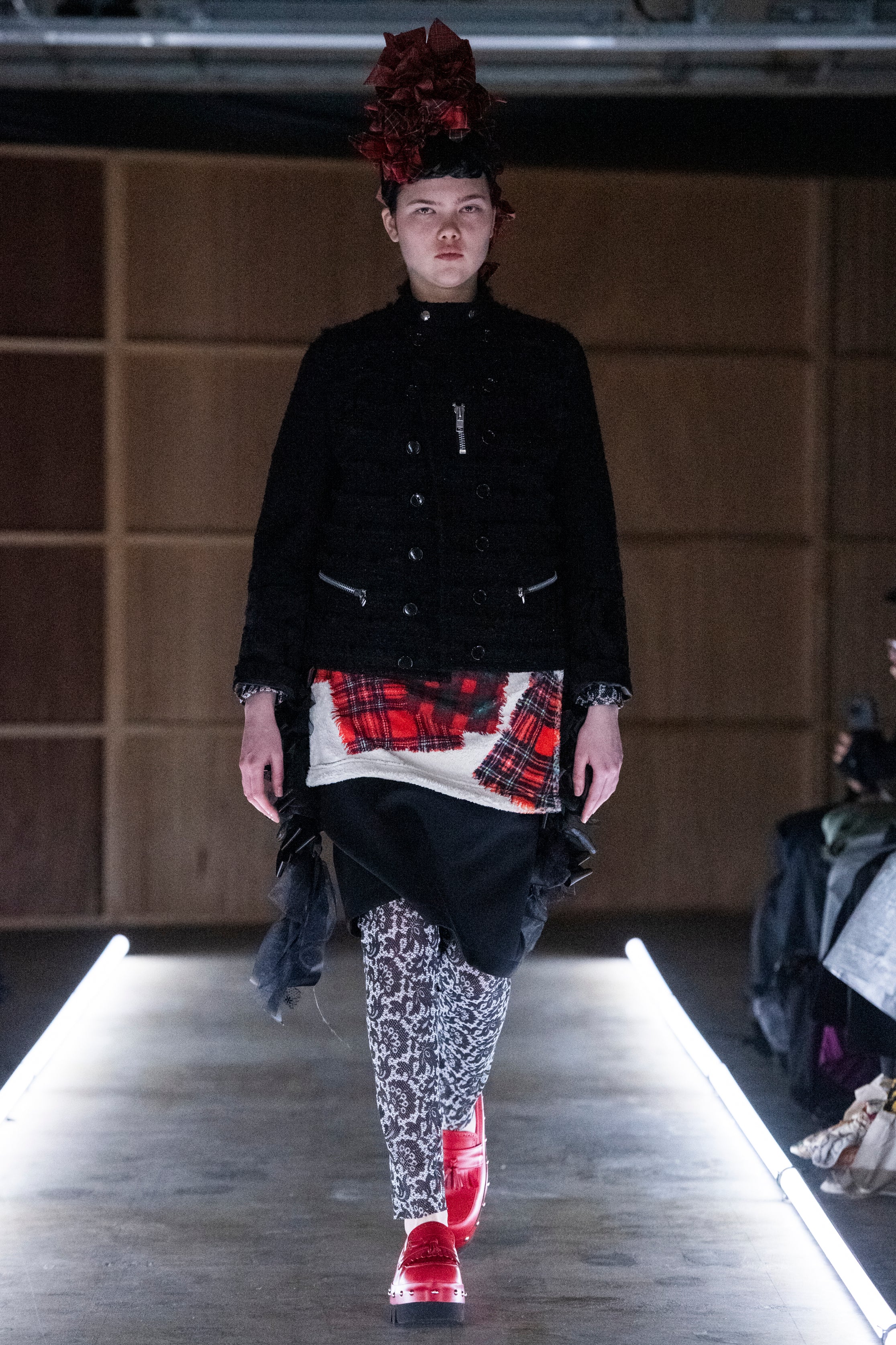 Fashion model wearing a tao outfit