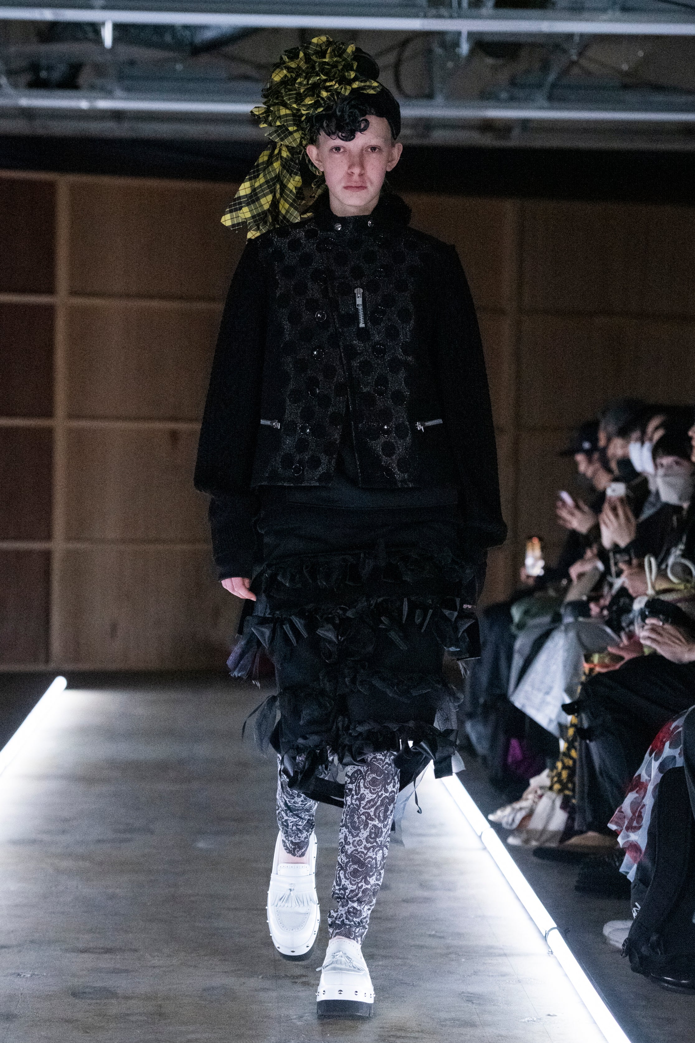 Fashion model wearing a tao outfit