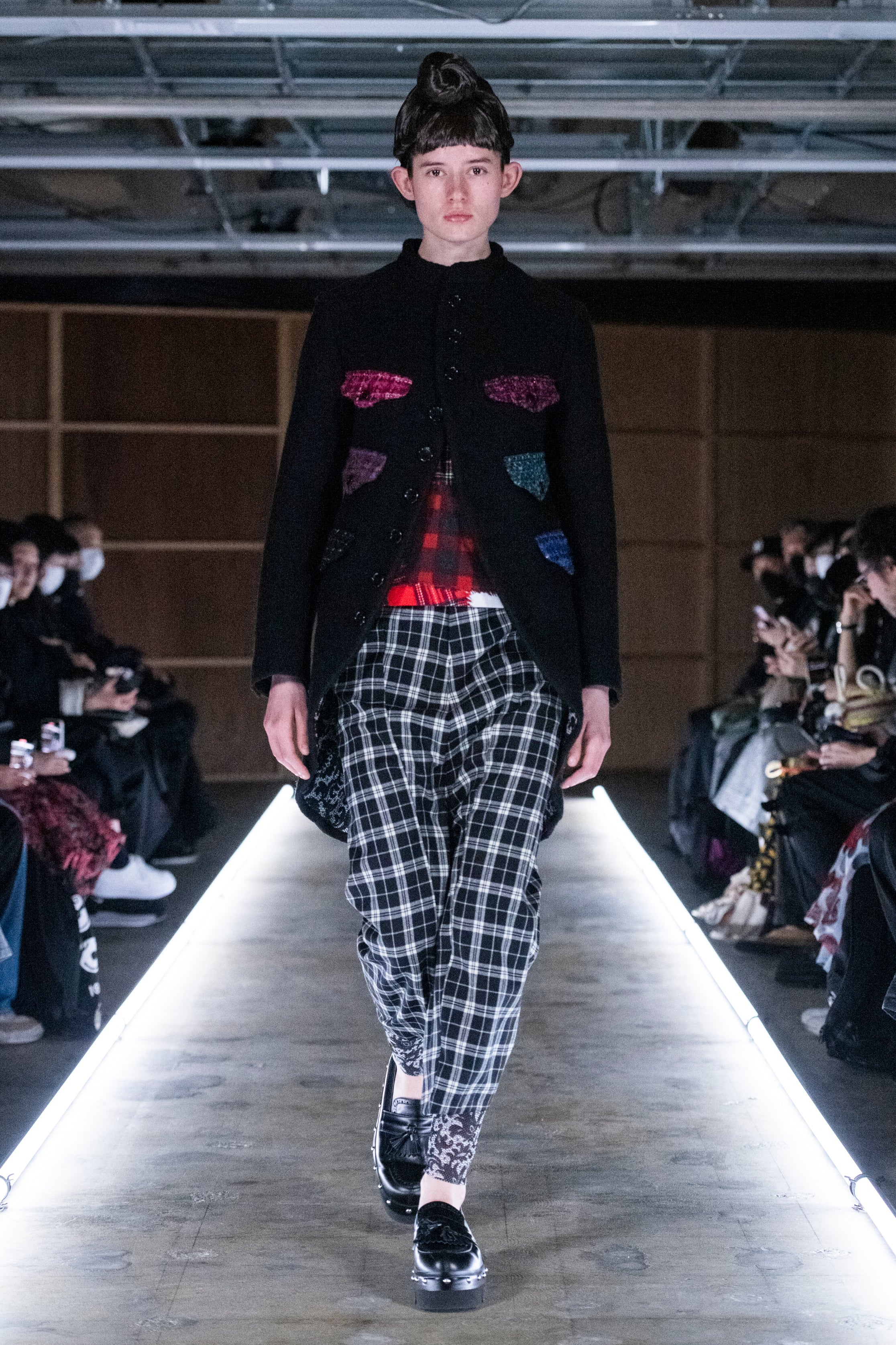 Fashion model wearing a tao outfit