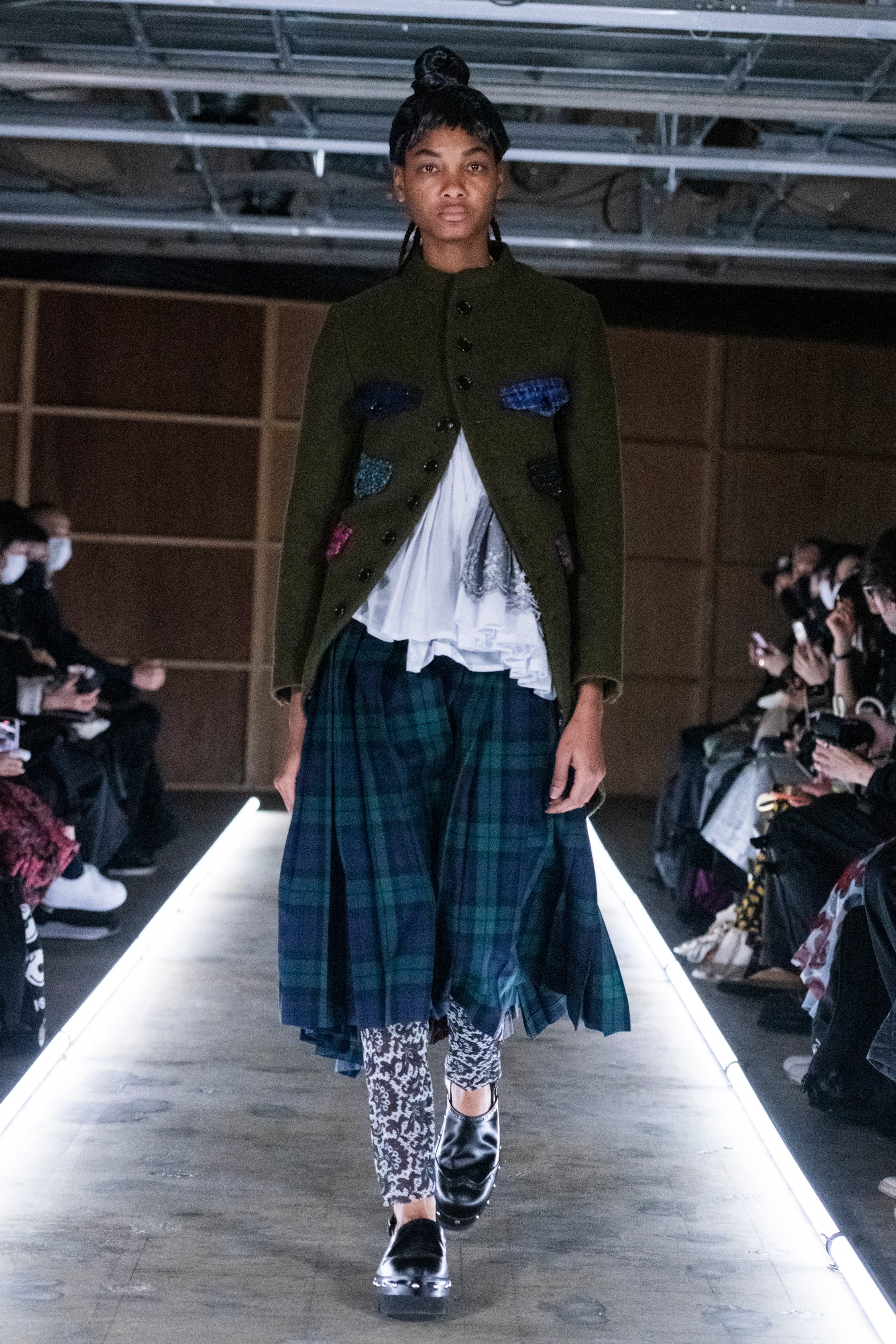 Fashion model wearing a tao outfit