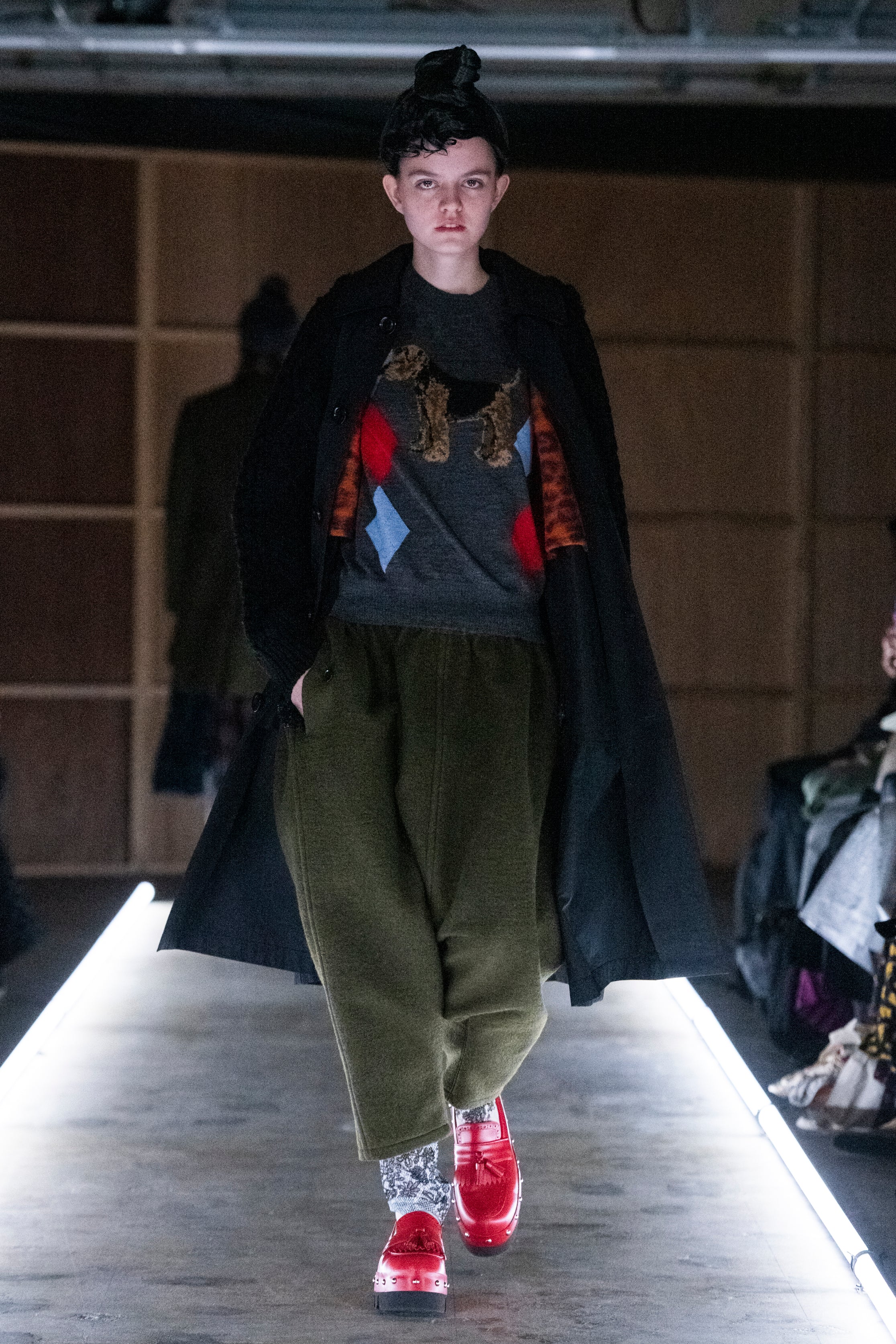 Fashion model wearing a tao outfit