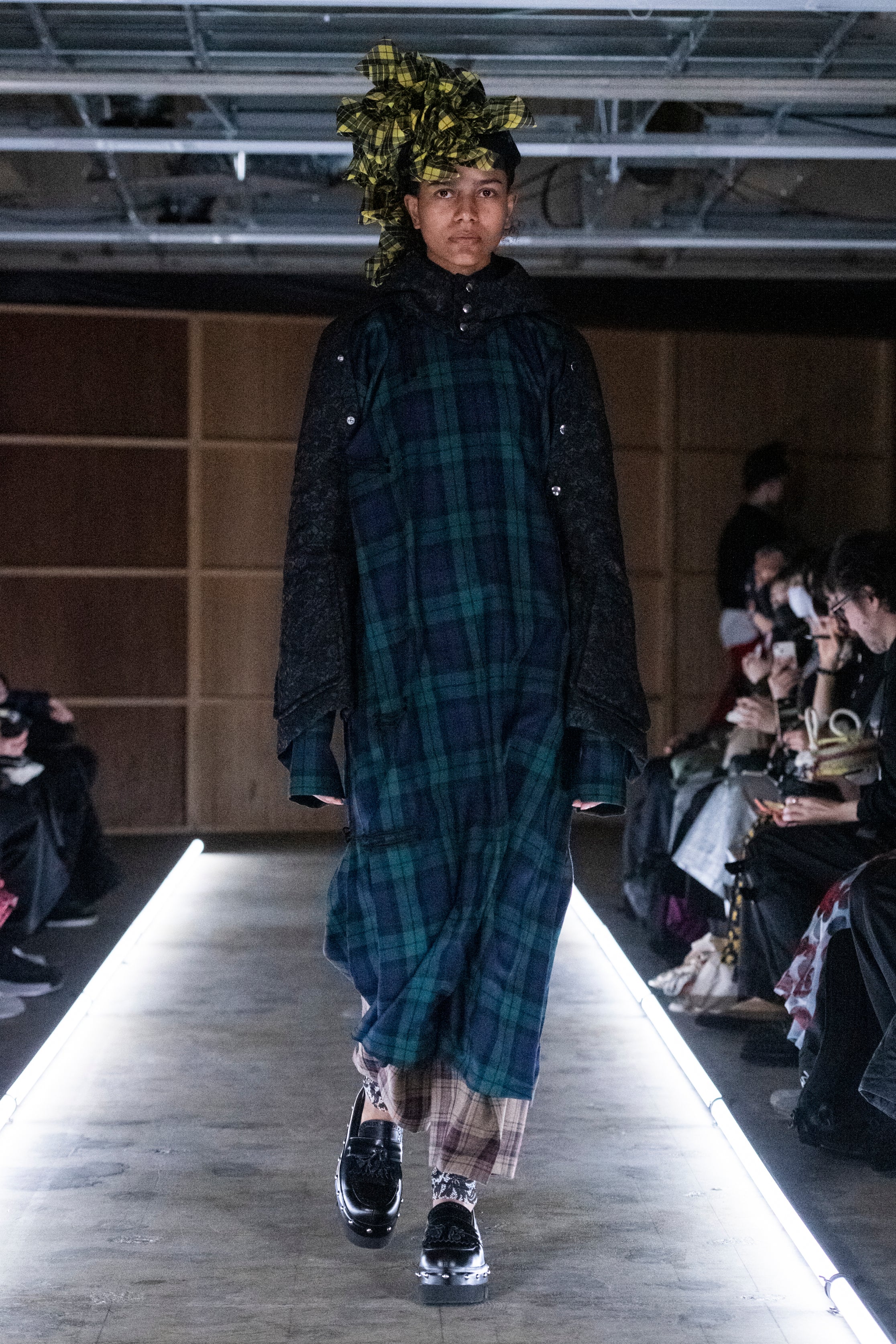 Fashion model wearing a tao outfit