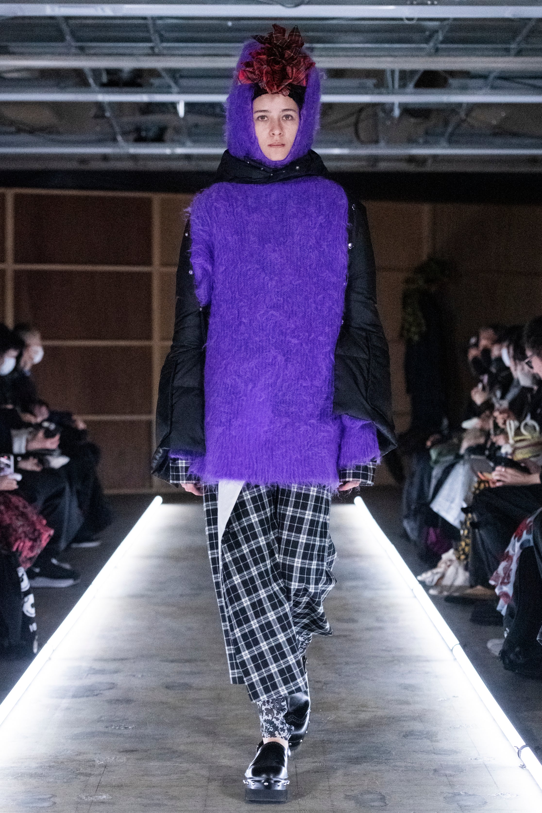 Fashion model wearing a tao outfit