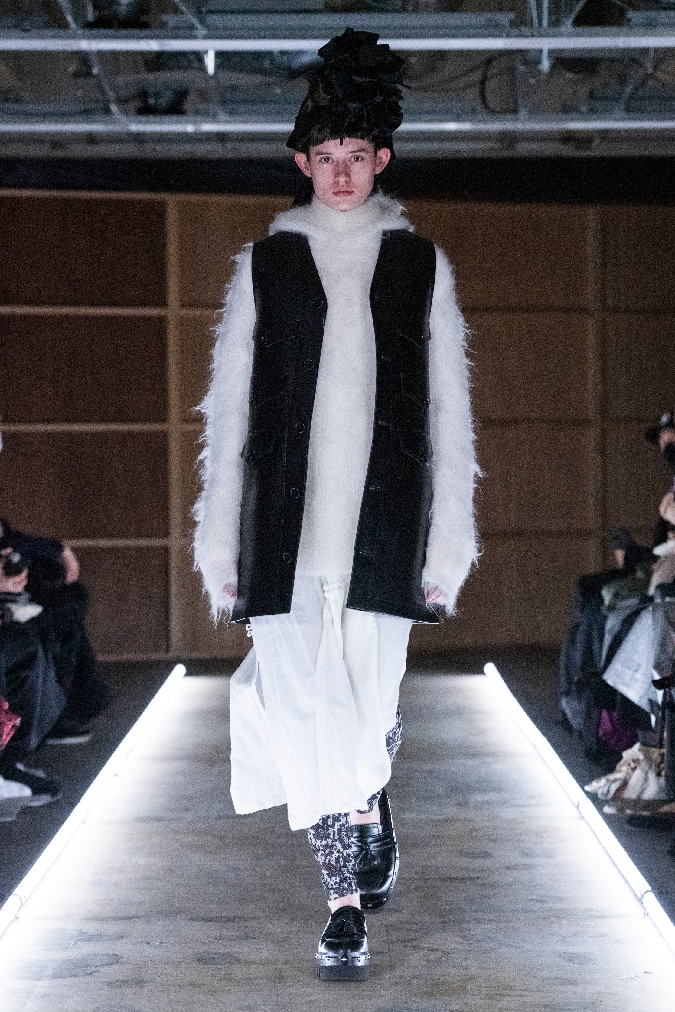 Fashion model wearing a tao outfit