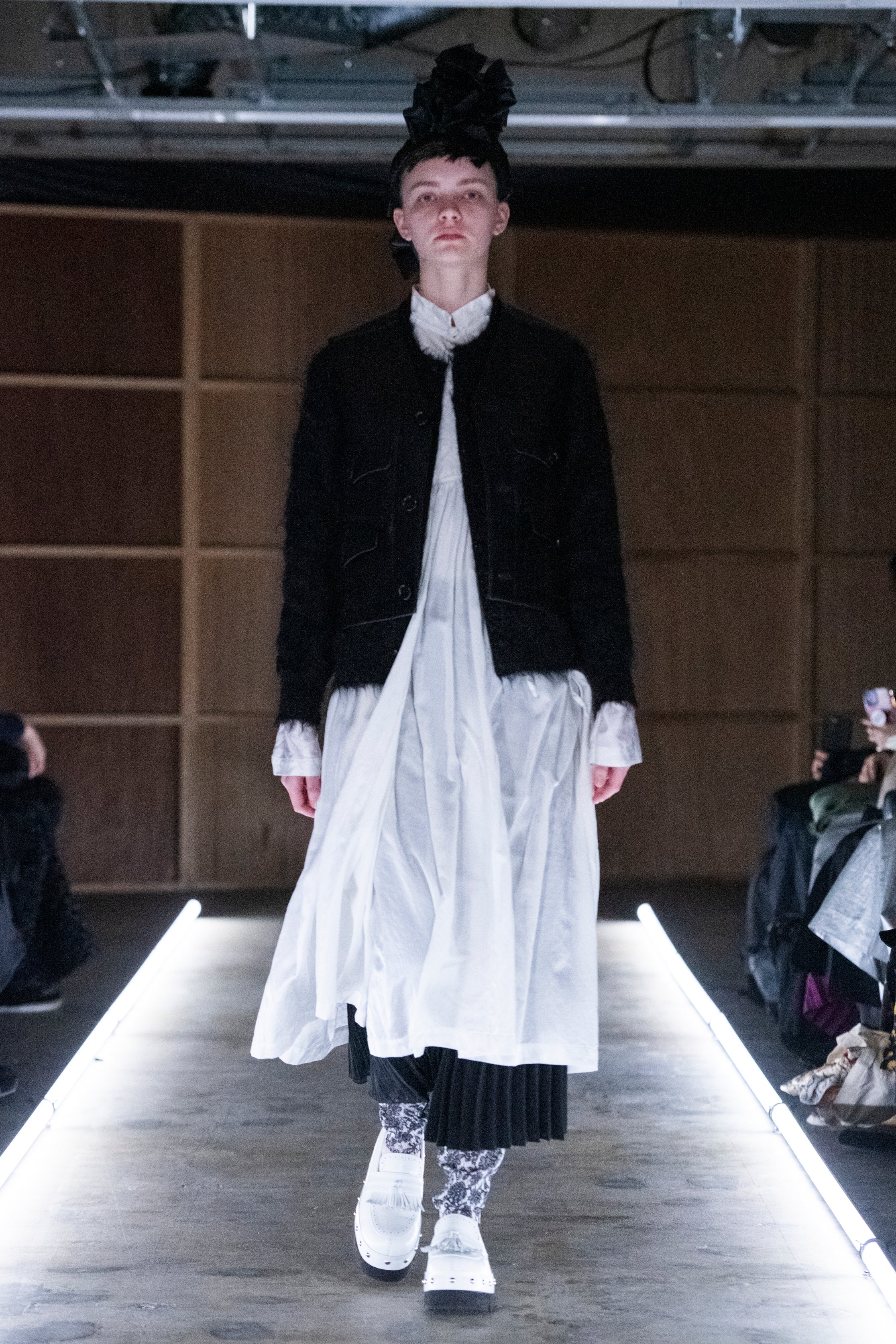Fashion model wearing a tao outfit