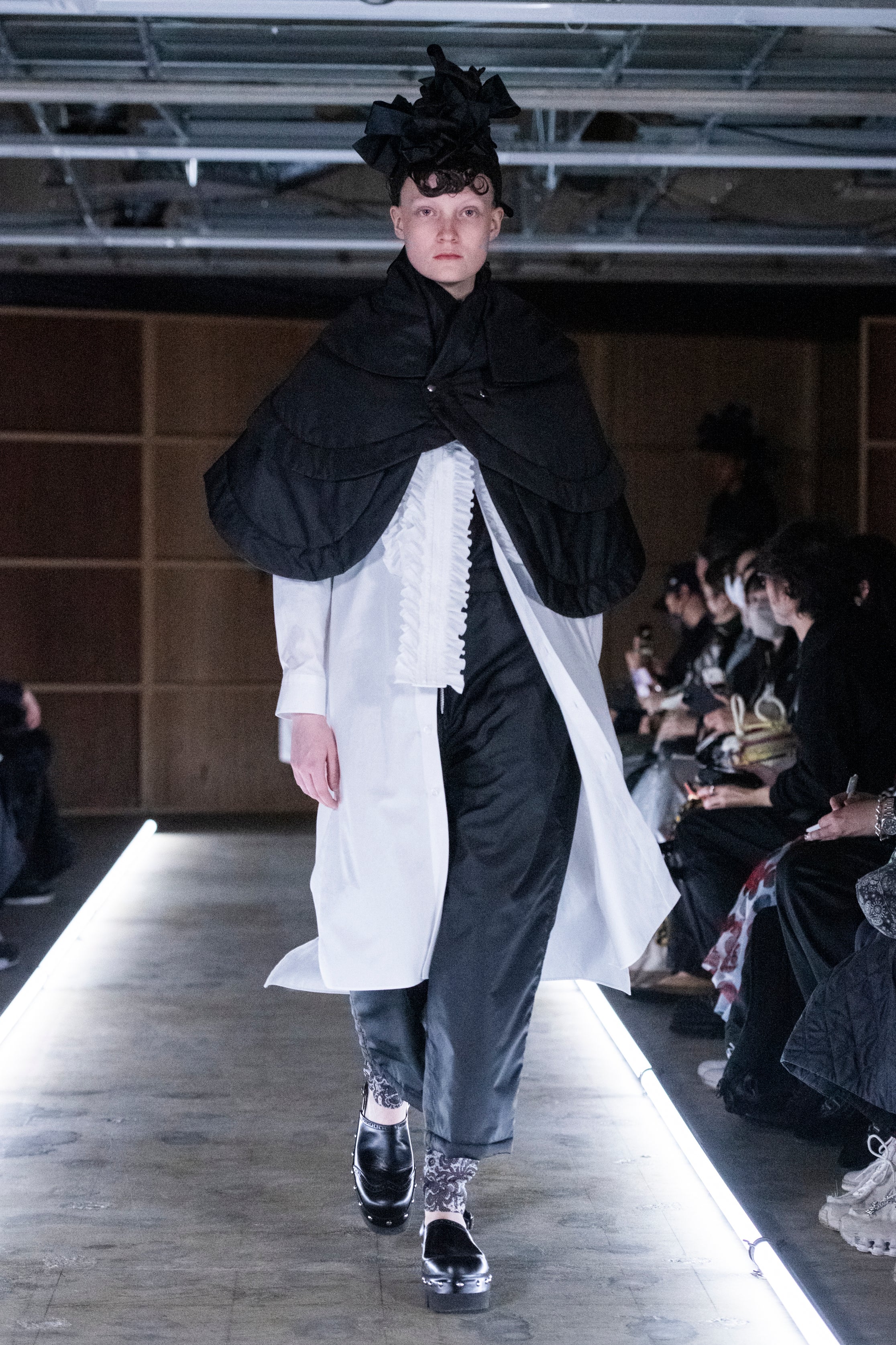 Fashion model wearing a tao outfit