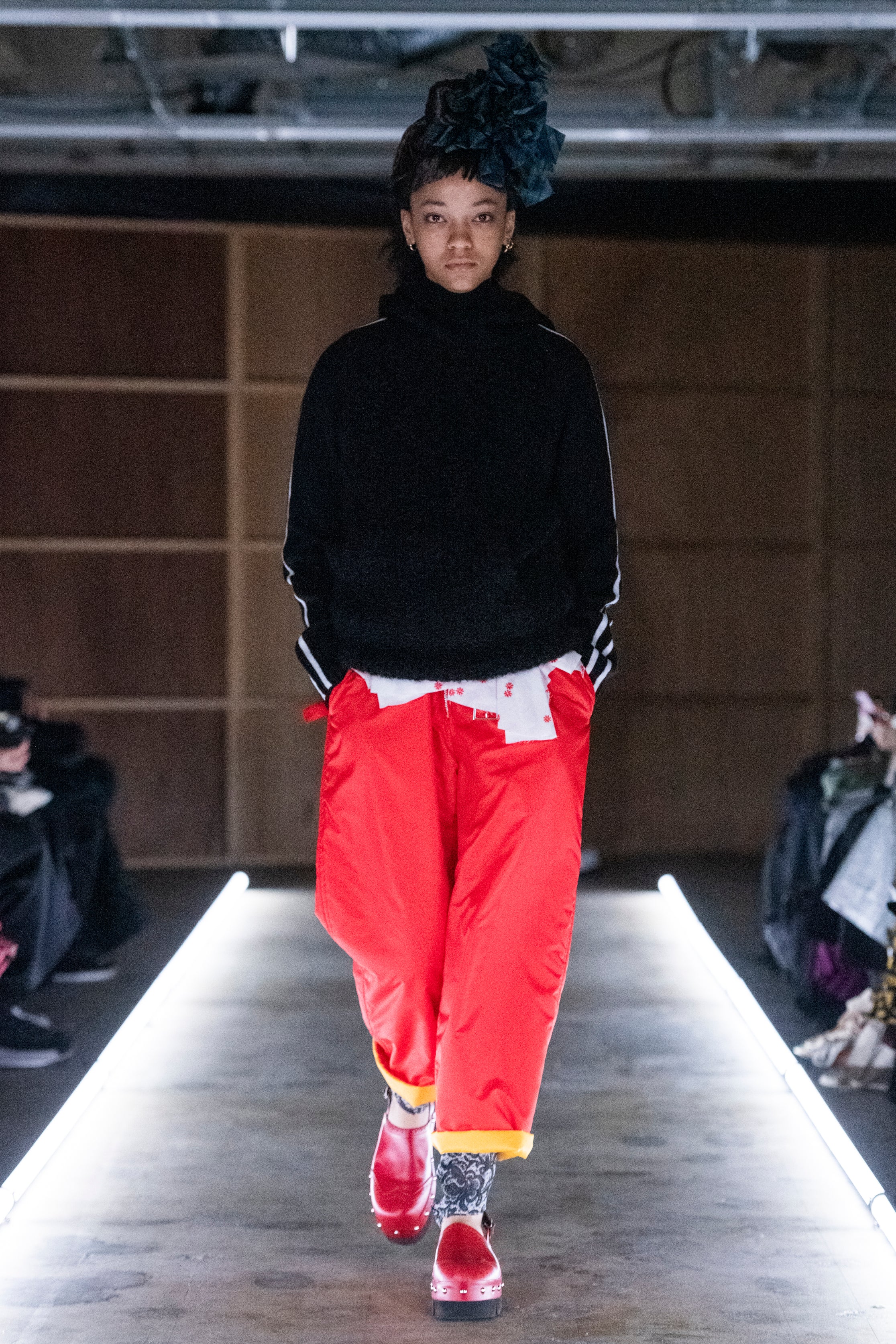 Fashion model wearing a tao outfit