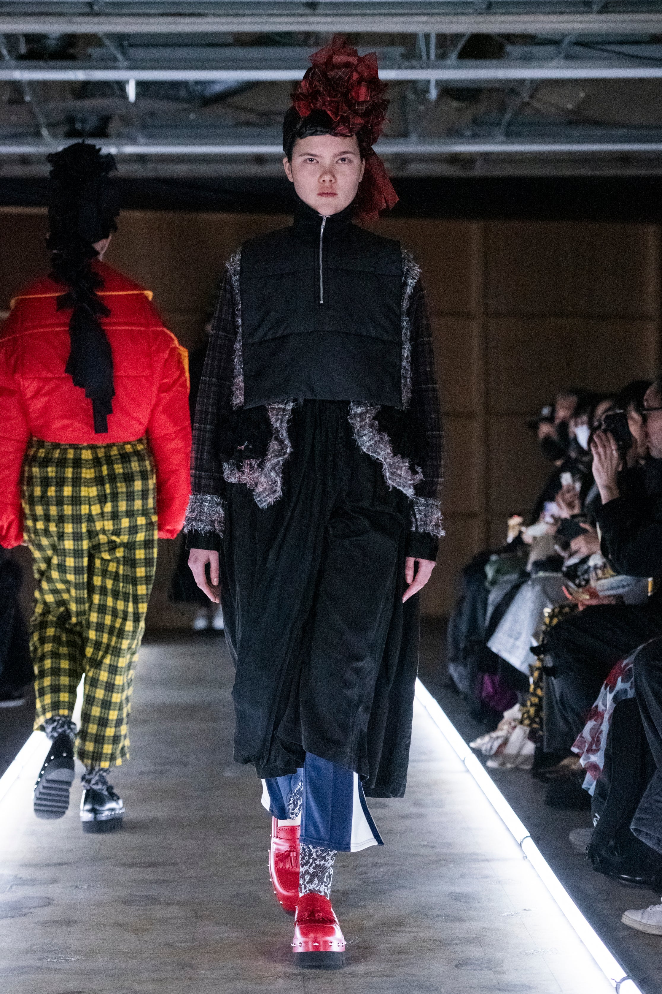 Fashion model wearing a tao outfit