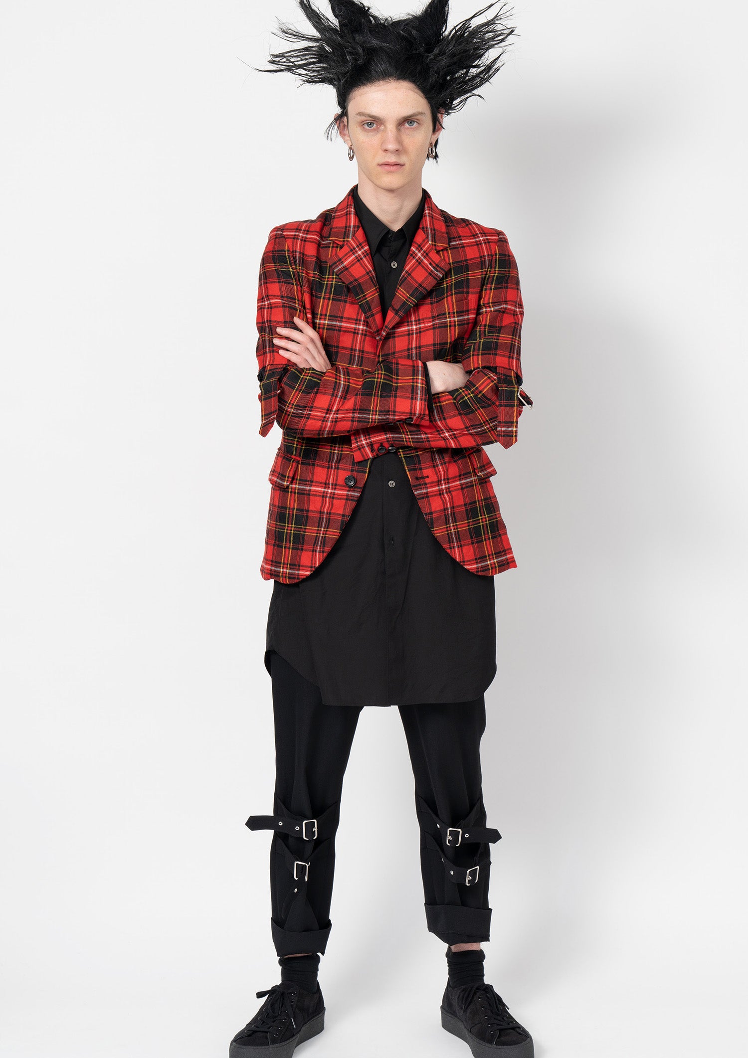 Fashion model wearing a Comme des Garçons Black outfit